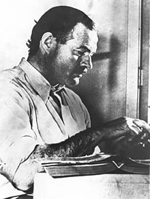 Ernestas Hemingwayʻus 1939 m. Nuotrauka iš http://en.wikipedia.org/wiki/Ernest_Hemingway